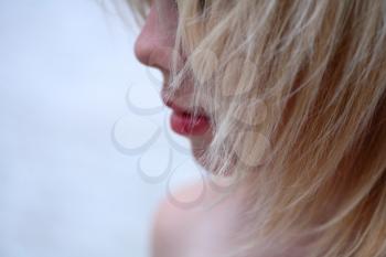 closeup of face - Beautiful young blonde female posing for camera