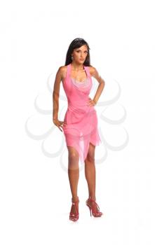 Sexy brunette lady in pink dress isolated on white.