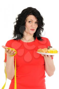 Royalty Free Photo of a Woman Holding Measuring Tape and Desserts