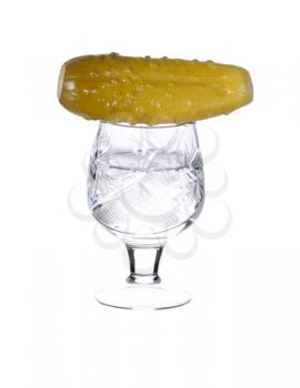Royalty Free Photo of a Pickle on a Glass