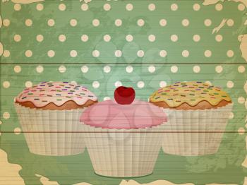 retro cupcakes on wooden background