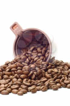 Cup with coffee beans on white