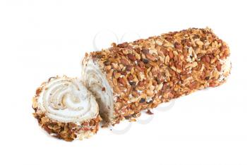 Nuts Swiss roll closeup isolated on a white background