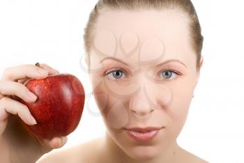 Royalty Free Photo of a Woman Holding an Apple