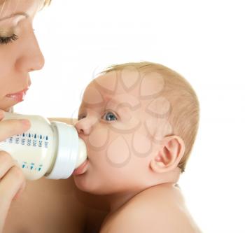 Royalty Free Photo of a Mother Feeding Her Baby