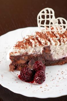 fresh tasty baked blackberry cake closeup at white plate