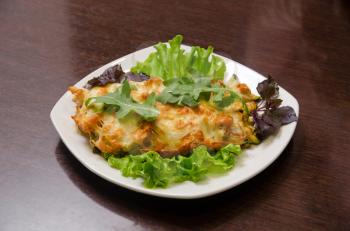 chicken fillet baked with zucchini, rucola lettuce
