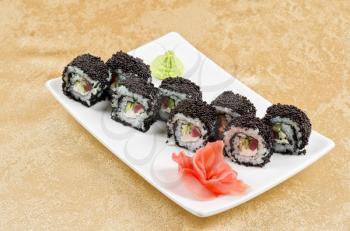 sushi roll with tuna, avacado, sauce and flying fish roe