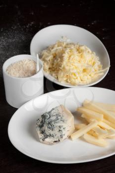 different cheese at white plate