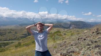 Man in Altai mountains. Resting in mountains concept