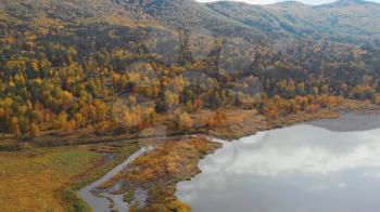 Aerial drone video of the Manjerokskoe lake, autumn shot, Altai Republic, Russia