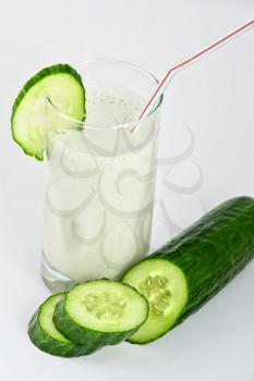 green cucumber coctail with kefir on white