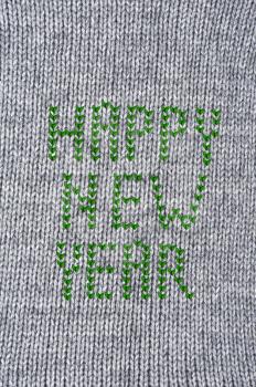 Woven wool white fabric texture with happy new year sign