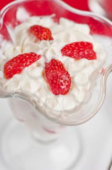 strawberry with cream closeup photo