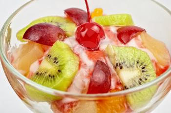 Fruit salad with ice cream in plate 