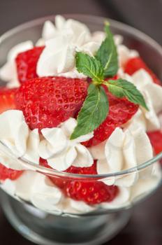 strawberry with cream closeup photo