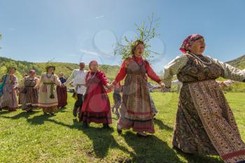 TOPOLNOE, ALTAY, RUSSIA - May 27, 2018: Folk festivities dedicated to the feast of the Holy Trinity. Ancient Russian rite: traditional dances.