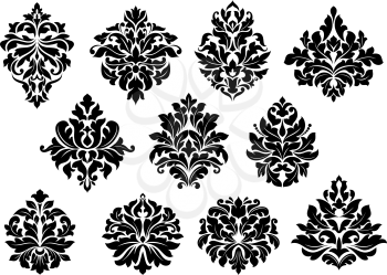 Set of black and white vector silhouette floral and foliate arabesque motifs suitable for damask style interior decor design elements