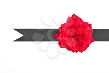 Royalty Free Photo of a Red Rose on Black Ribbon