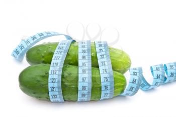 Royalty Free Photo of Cucumbers and Measuring Tape
