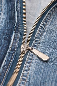 Detail of zipper on blue jeans 