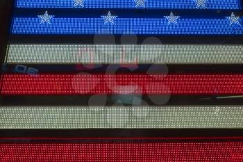 Night views of New York City, USA. American Flag at Times Square.