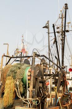 Detail of commercial fishing boat equipment at the dock.