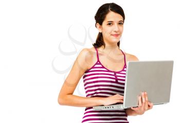 Royalty Free Photo of a Woman Standing and Using a Laptop
