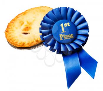 Royalty Free Photo of a Whole Pie and a First Place Ribbon
