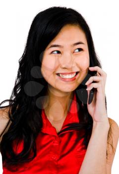 Royalty Free Photo of a Young Woman Talking on a Mobile Phone