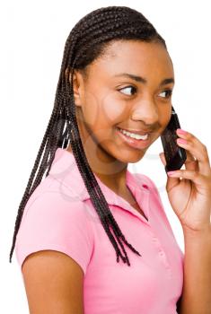 Royalty Free Photo of a Teenage Girl Talking on a Mobile Phone