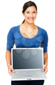 Royalty Free Photo of a Woman Presenting a Laptop