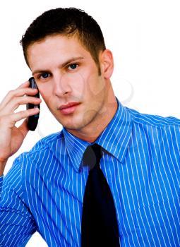 Close-up of a man talking on a mobile phone isolated over white