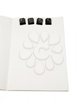 Notebook with word blog of keyboard keys on it isolated over white