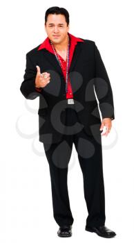 Mid adult man pointing isolated over white