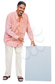African American mature man showing a placard isolated over white