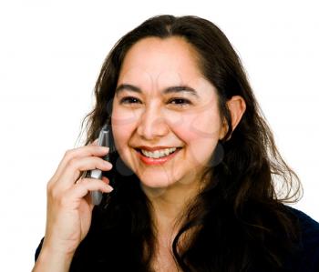Mid adult woman talking on a mobile phone isolated over white