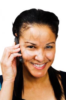 Portrait of a woman talking on a mobile phone isolated over white