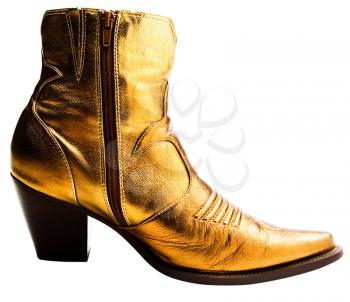 Fashionable boot of golden color isolated over white