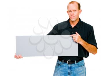 Mature man showing an empty placard isolated over white