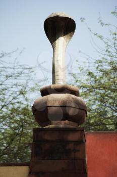 Statue of a snake in a garden, Lakshmi Narayan Temple, New Delhi, India