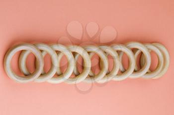 Curtain rings in a row