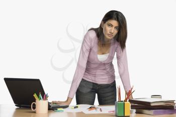 Female fashion designer working in an office