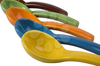 Close-up of ceramic soup spoons
