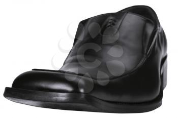 Close-up of a black leather shoe