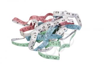 Close-up of tangled tape measures
