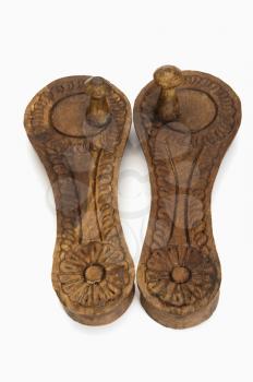 Close-up of a pair of Paduka a traditional Indian wooden footwear worn by Hindu priests and Brahmins