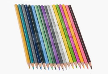 Close-up of colored pencils in a row