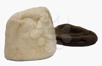 Close-up of two fur hats