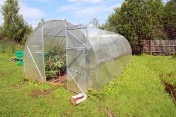 plastic hothouse in rural homestead